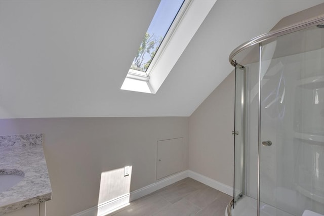 24-26 Bentley St, Boston, MA 02135 - additional living space featuring a skylight and lofted ceiling