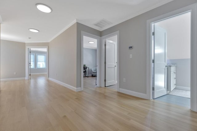 24-26 Bentley St, Boston, MA 02135 - unfurnished room featuring ornamental molding and light wood finished floors