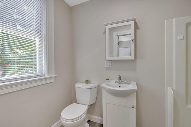 24-26 Bentley St, Boston, MA 02135 - half bathroom with vanity and toilet
