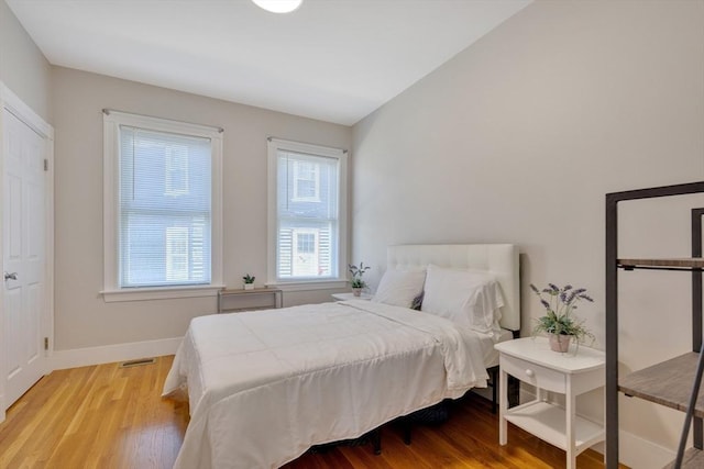 24-26 Bentley St, Boston, MA 02135 - bedroom with light wood-style floors and baseboards