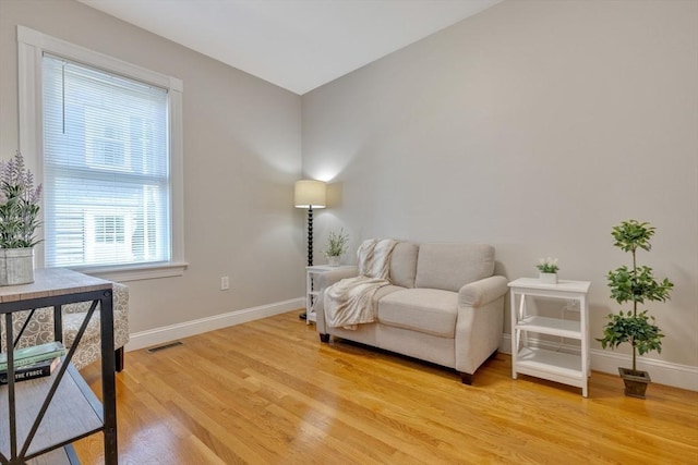 24-26 Bentley St, Boston, MA 02135 - sitting room featuring baseboards and light wood-style floors