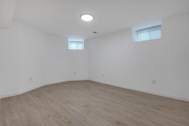 24-26 Bentley St, Boston, MA 02135 - basement with light wood-type flooring and baseboards