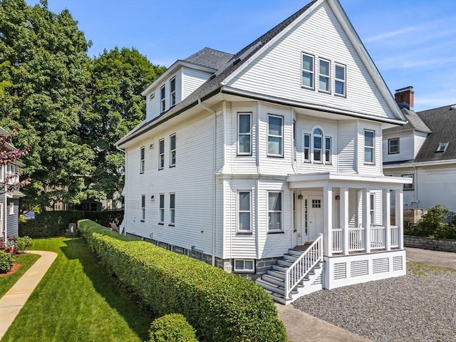 24-26 Bentley St, Boston, MA 02135 - view of front facade with a porch