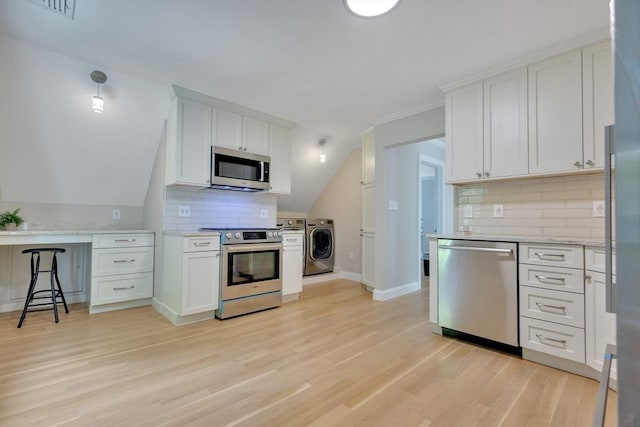 24-26 Bentley St, Boston, MA 02135 - kitchen with stainless steel appliances, independent washer and dryer, backsplash, light wood-style flooring, and white cabinetry
