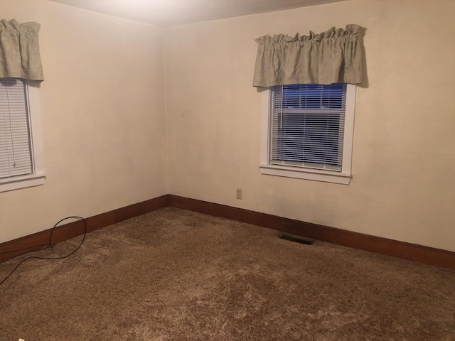 unfurnished room with carpet