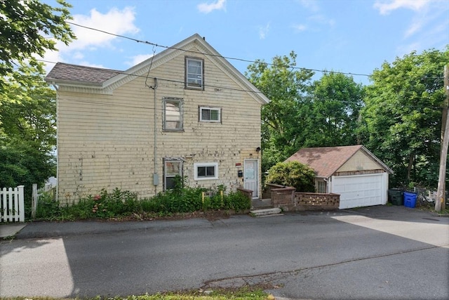 376 N Underwood St, Fall River, MA 02720 - view of home's exterior with an outbuilding and a detached garage