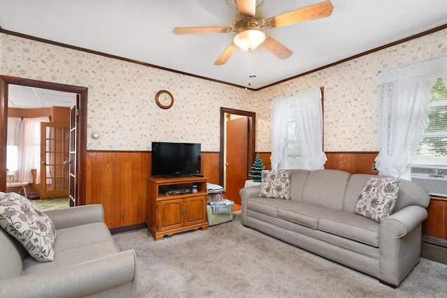 376 N Underwood St, Fall River, MA 02720 - living room featuring a wainscoted wall, plenty of natural light, crown molding, wood walls, and ceiling fan