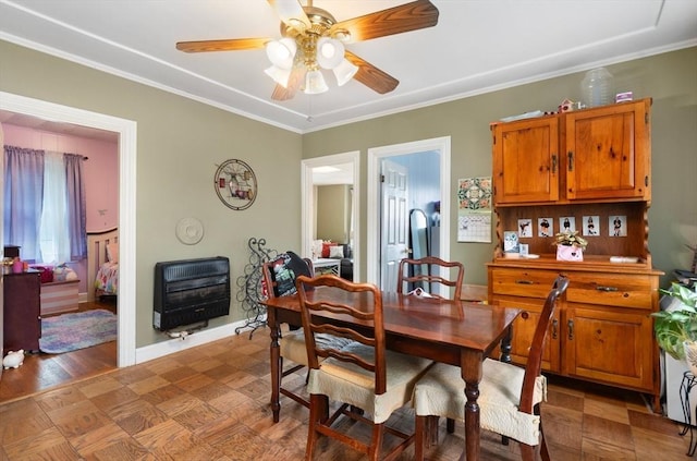 376 N Underwood St, Fall River, MA 02720 - dining room with heating unit, a ceiling fan, and crown molding