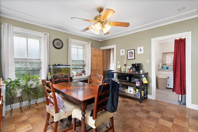 376 N Underwood St, Fall River, MA 02720 - dining area with ornamental molding and a ceiling fan