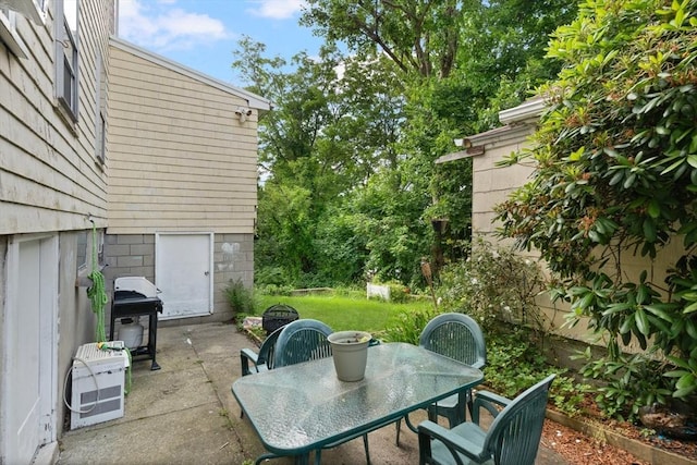 376 N Underwood St, Fall River, MA 02720 - view of patio featuring outdoor dining space and a grill