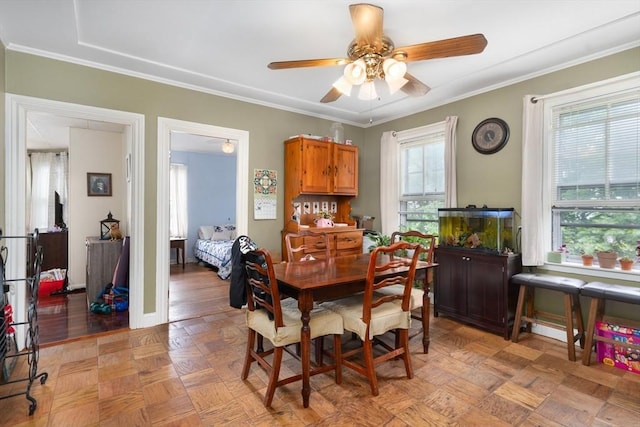 376 N Underwood St, Fall River, MA 02720 - dining space featuring a ceiling fan and crown molding