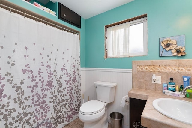 376 N Underwood St, Fall River, MA 02720 - bathroom with a wainscoted wall, vanity, and curtained shower