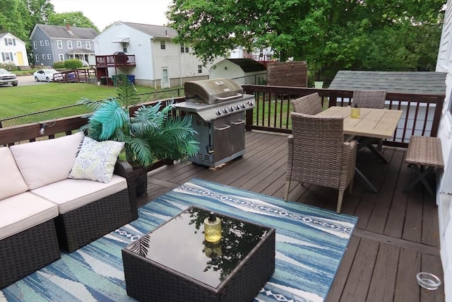 17 Lockwood Ave, Attleboro, MA 02703 - wooden deck featuring a grill, an outdoor living space, outdoor dining space, a residential view, and a yard