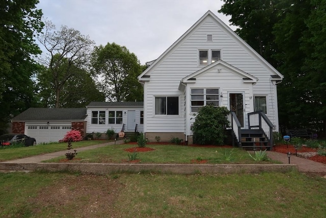 17 Lockwood Ave, Attleboro, MA 02703 - view of front of home with a front yard and a garage