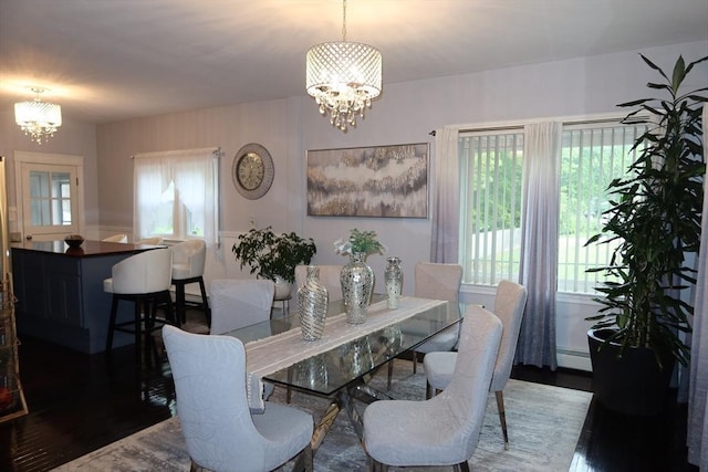 17 Lockwood Ave, Attleboro, MA 02703 - dining room featuring a chandelier, baseboard heating, and wood finished floors