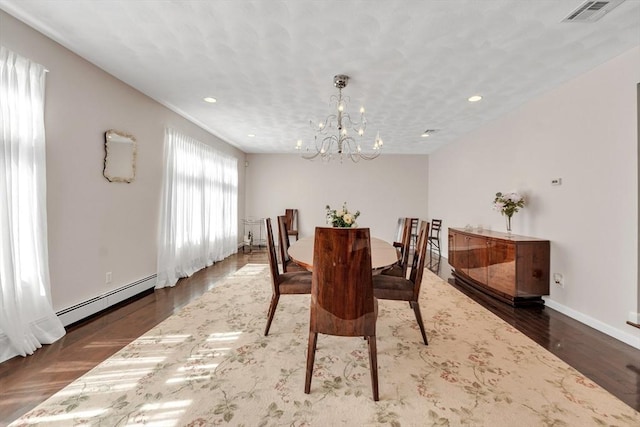 14 Pleasant View Ave, Lynn, MA 01902 - dining area with a baseboard heating unit, a chandelier, recessed lighting, and wood finished floors