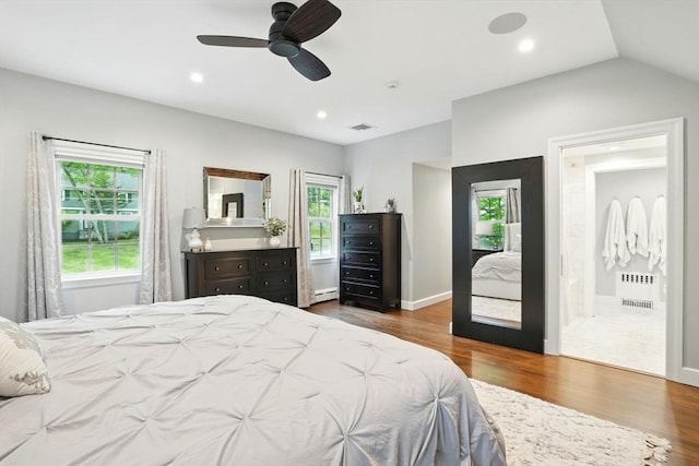 12 Olde Lyme Rd, Winchester, MA 01890 - bedroom featuring wood finished floors, baseboard heating, vaulted ceiling, ceiling fan, and baseboards