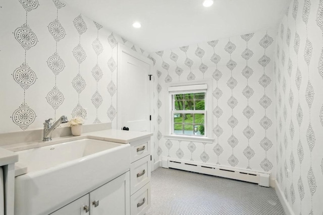 12 Olde Lyme Rd, Winchester, MA 01890 - bathroom featuring a baseboard heating unit, vanity, recessed lighting, and wallpapered walls