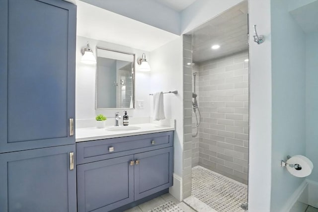 12 Olde Lyme Rd, Winchester, MA 01890 - full bath featuring walk in shower, vanity, and tile patterned floors