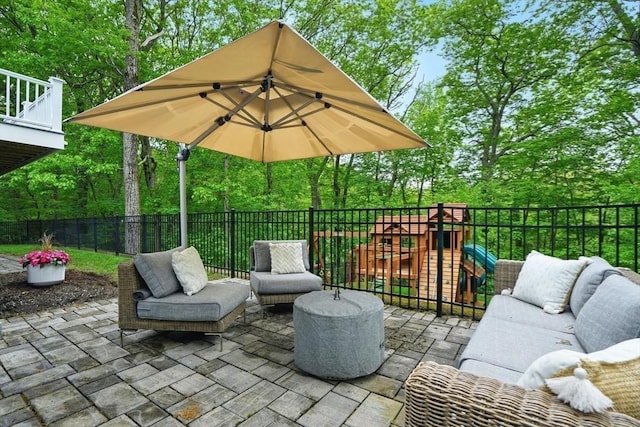 12 Olde Lyme Rd, Winchester, MA 01890 - view of patio featuring an outdoor living space and a playground