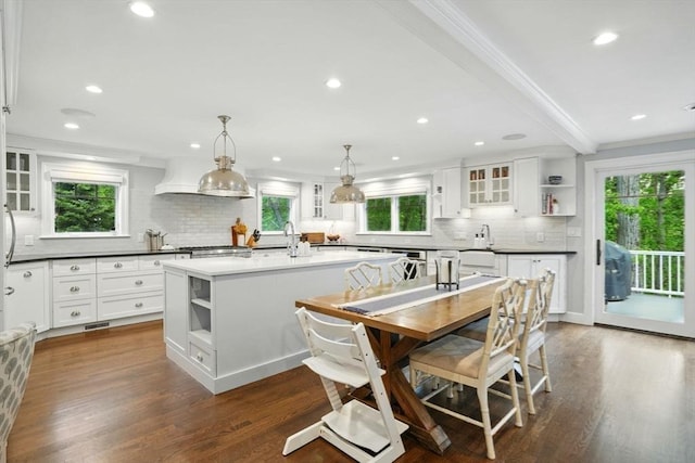 12 Olde Lyme Rd, Winchester, MA 01890 - kitchen featuring open shelves, backsplash, a center island with sink, recessed lighting, and beamed ceiling