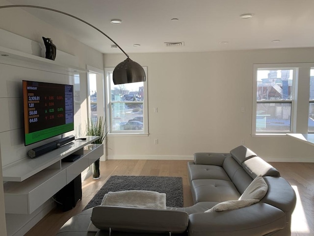 16 Boardman St Unit 204A, Boston, MA 02128 - living room featuring light wood-style floors, baseboards, and recessed lighting