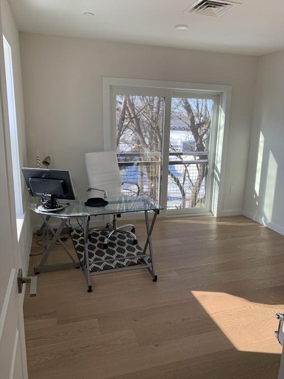 16 Boardman St Unit 204A, Boston, MA 02128 - home office with wood finished floors and baseboards