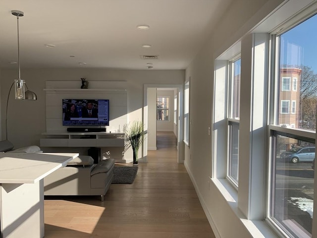 16 Boardman St Unit 204A, Boston, MA 02128 - hallway featuring wood finished floors, recessed lighting, and baseboards