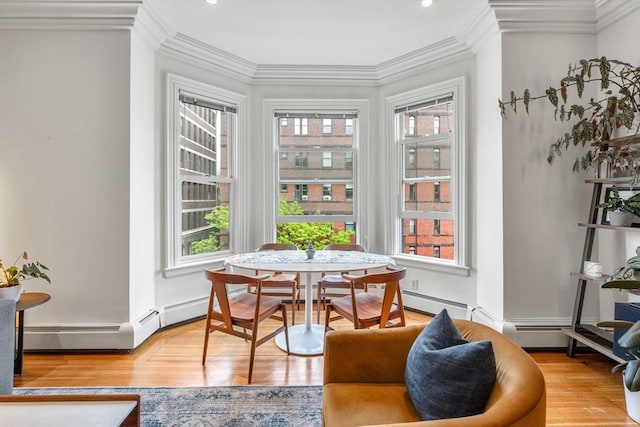 31 Massachusetts Ave Unit 4-4, Boston, MA 02115 - dining space with wood finished floors and crown molding