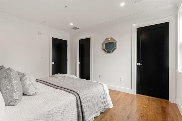 bedroom featuring light hardwood / wood-style flooring