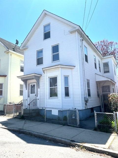 129 3rd St, Lowell, MA 01850 - view of front of property with central AC