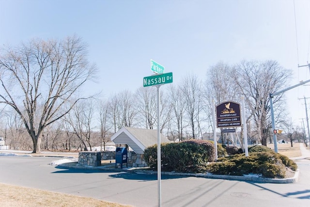 view of street with sidewalks and curbs