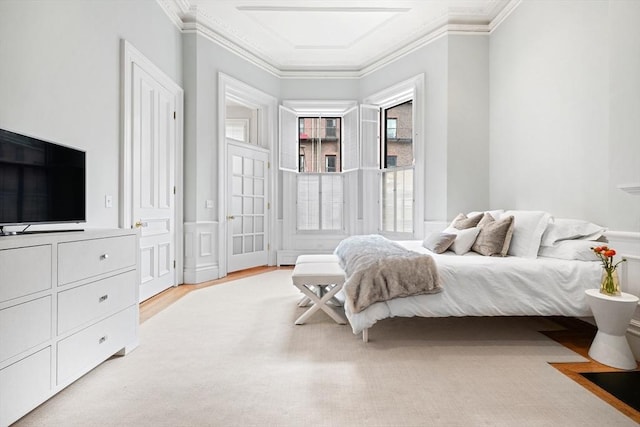 bedroom with ornamental molding