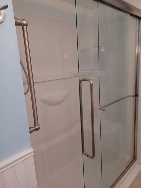 822 N Eastern Ave, Fall River, MA 02720 - full bath featuring a stall shower and wainscoting