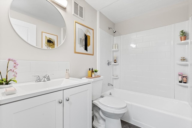 74 Springvale Ave Unit 7, Chelsea, MA 02150 - bathroom featuring vanity, toilet, shower / tub combination, and decorative backsplash