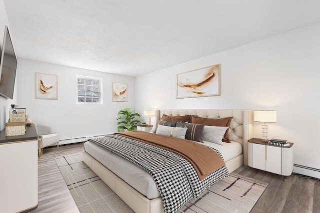 74 Springvale Ave Unit 7, Chelsea, MA 02150 - bedroom with wood finished floors and baseboard heating