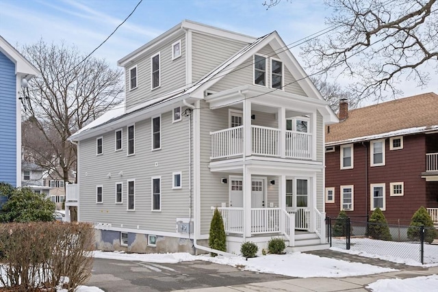 view of front of house with a balcony