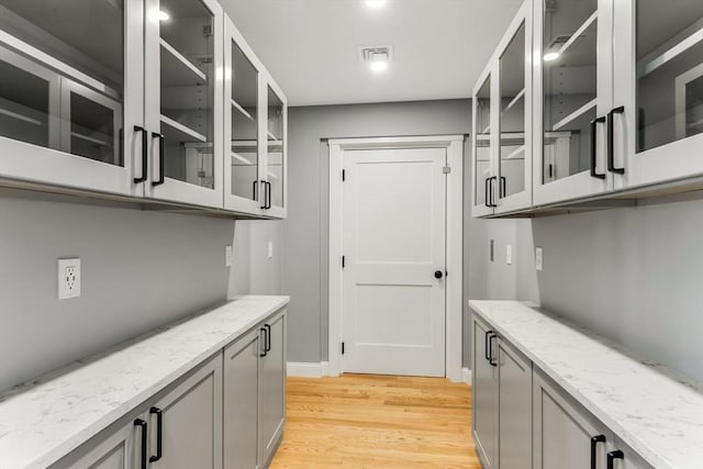29 Sheppard Rd, Bourne, MA 02562 - bar with light wood-style floors and baseboards