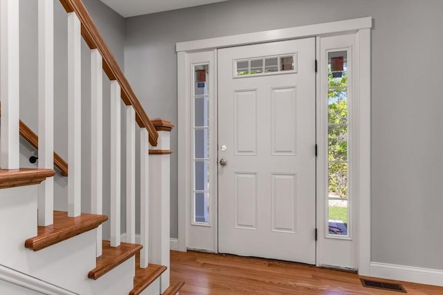 29 Sheppard Rd, Bourne, MA 02562 - entrance foyer with stairs and wood finished floors