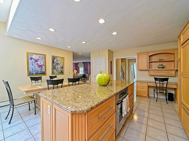 46 Clear Pond Rd, Falmouth, MA 02540 - kitchen featuring oven, light tile patterned flooring, a center island, recessed lighting, and open shelves