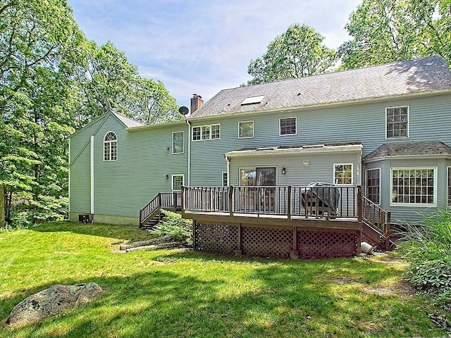46 Clear Pond Rd, Falmouth, MA 02540 - rear view of property with a lawn, a wooden deck, and a chimney