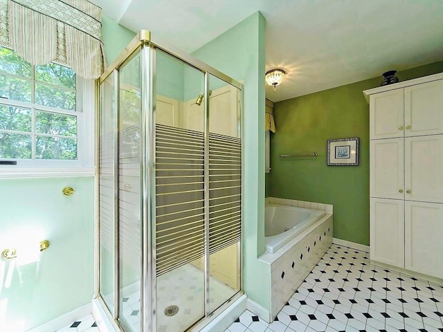 46 Clear Pond Rd, Falmouth, MA 02540 - bathroom with a bath, a stall shower, and tile patterned floors