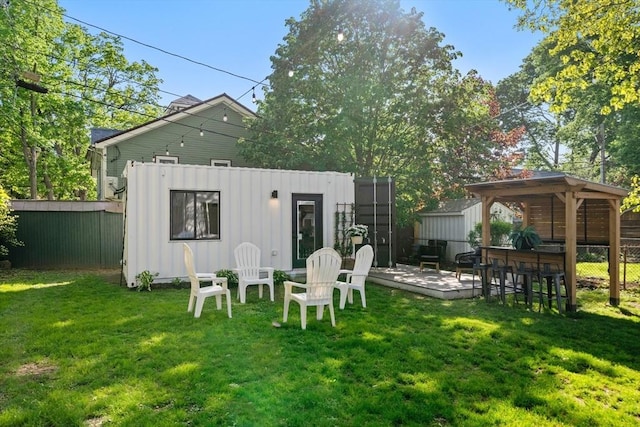 rear view of house with a deck