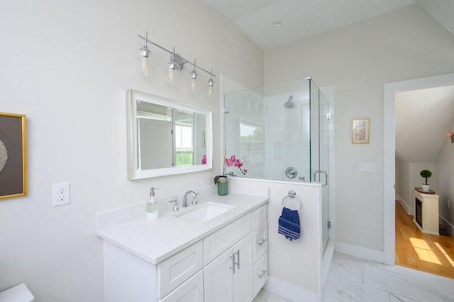 6 Macdonald Ter Unit E, Scituate, MA 02066 - full bathroom featuring vanity, a shower stall, marble finish floors, and baseboards