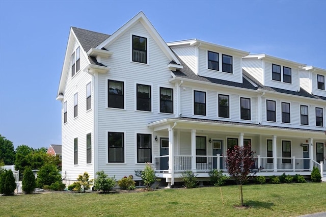 6 Macdonald Ter Unit E, Scituate, MA 02066 - multi unit property featuring covered porch and a front yard