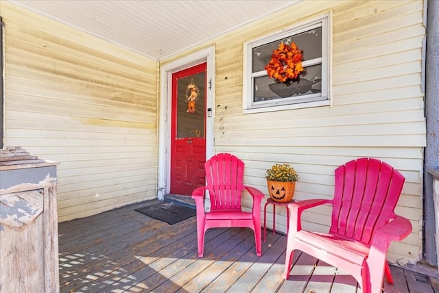 doorway to property with a porch