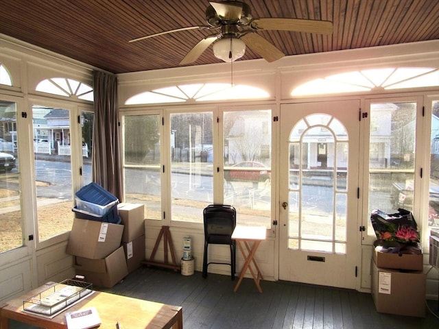 sunroom / solarium featuring wood ceiling and ceiling fan