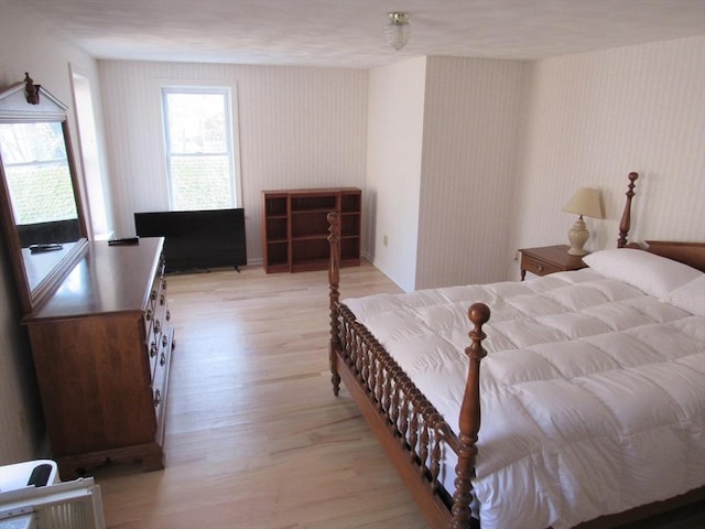 bedroom featuring light wood-style flooring