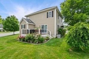 5 Comanche Cir Unit 5, Haverhill, MA 01835 - rear view of property with a deck and a yard
