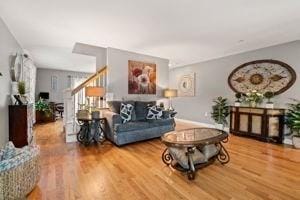 5 Comanche Cir Unit 5, Haverhill, MA 01835 - living area with wood finished floors and stairs